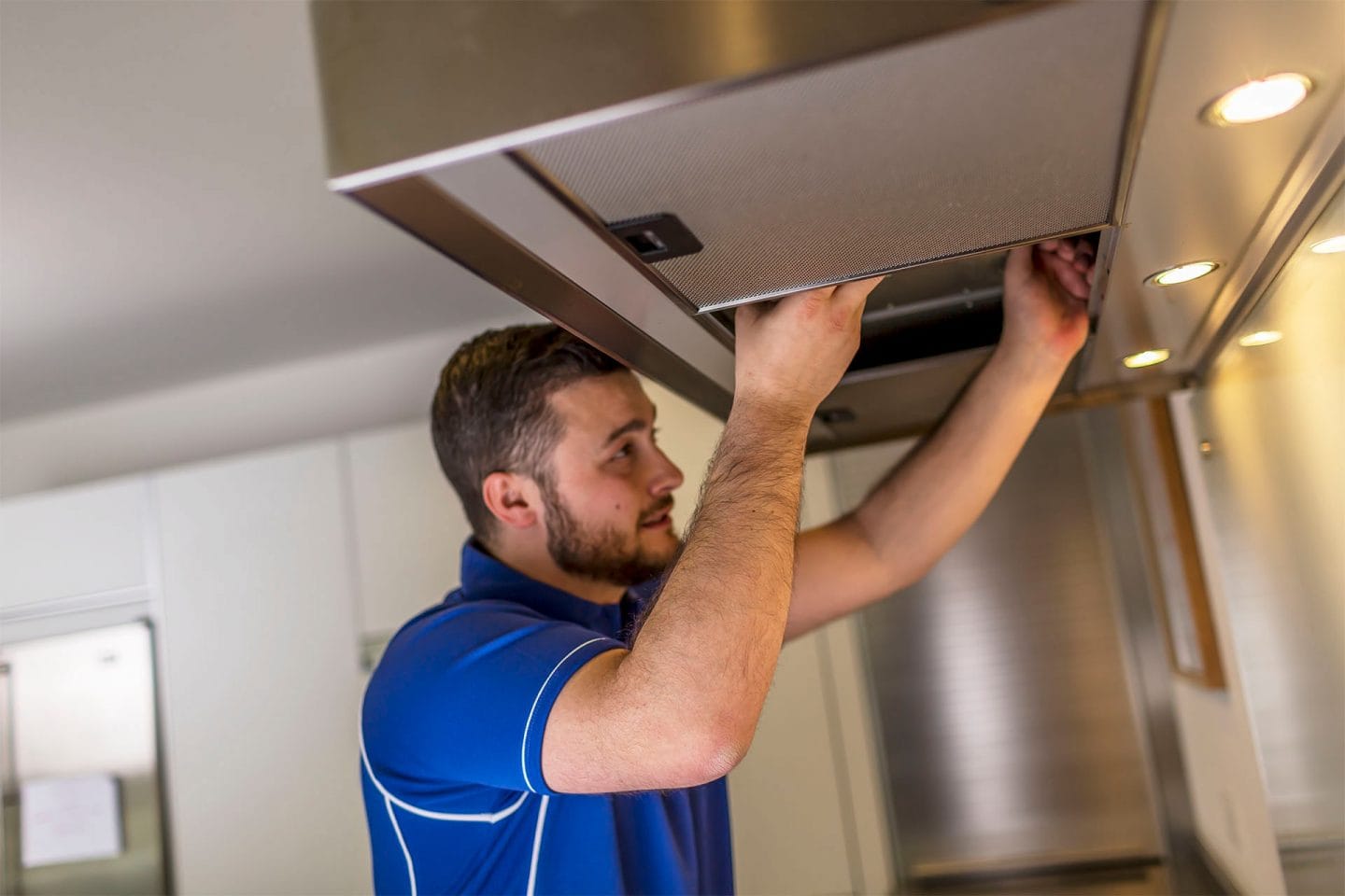 Kitchen hood installer fitting commercial canopy in Amersham